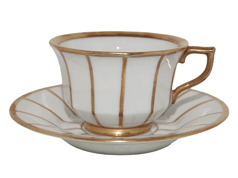 White Curved with  gold edge
Small demitasse cup