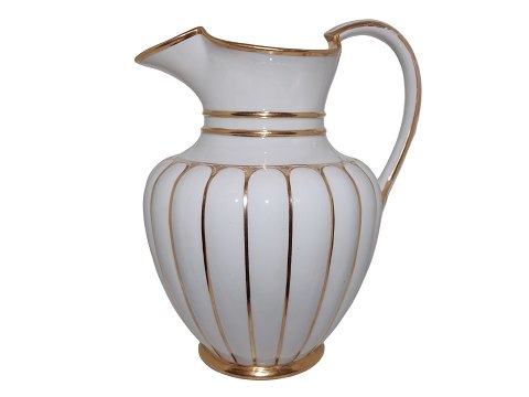 White Curved with  gold edge
Large and rare pitcher for punch