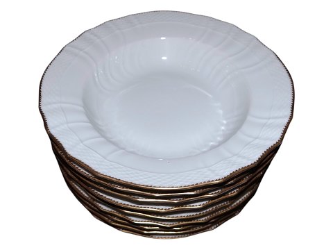 White curved with gold edge
Large soup plate 24.7 cm.