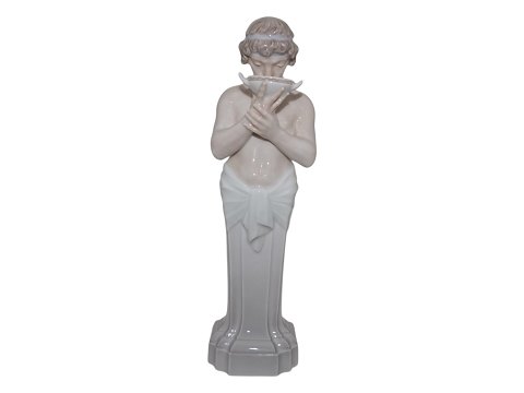 Rare Royal Copenhagen figurine
Man with drinking bowl