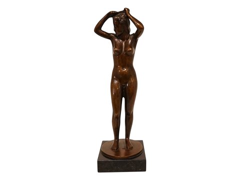 Volmer Bahner
Bronze figur af nøgen dame der reder hår