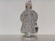 Royal CopenhagenRare Art Nouveau figurine - Girl in fancy coat with umbrella and book