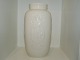 Royal Copenhagen blanc de chineTall vase decorated with four people from 1956