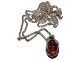 Niels P. DesignSmall amber pendant set in silver with necklace