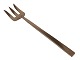 Scanline Bronze
Large serving fork 25 cm.