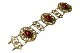 Italy
Wide gilded bracelet with stones