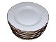 White curved with gold edge
Dinner plate 24.7 cm.