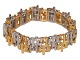 Michelsen 18 karat guld 
Kraftigt og bredt brutalisme armbånd af Knud V. 
Andersen fra 1975-1989