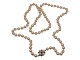 Long Akoya pearl necklace with 14 carat white gold 
pendant with blue sapphires